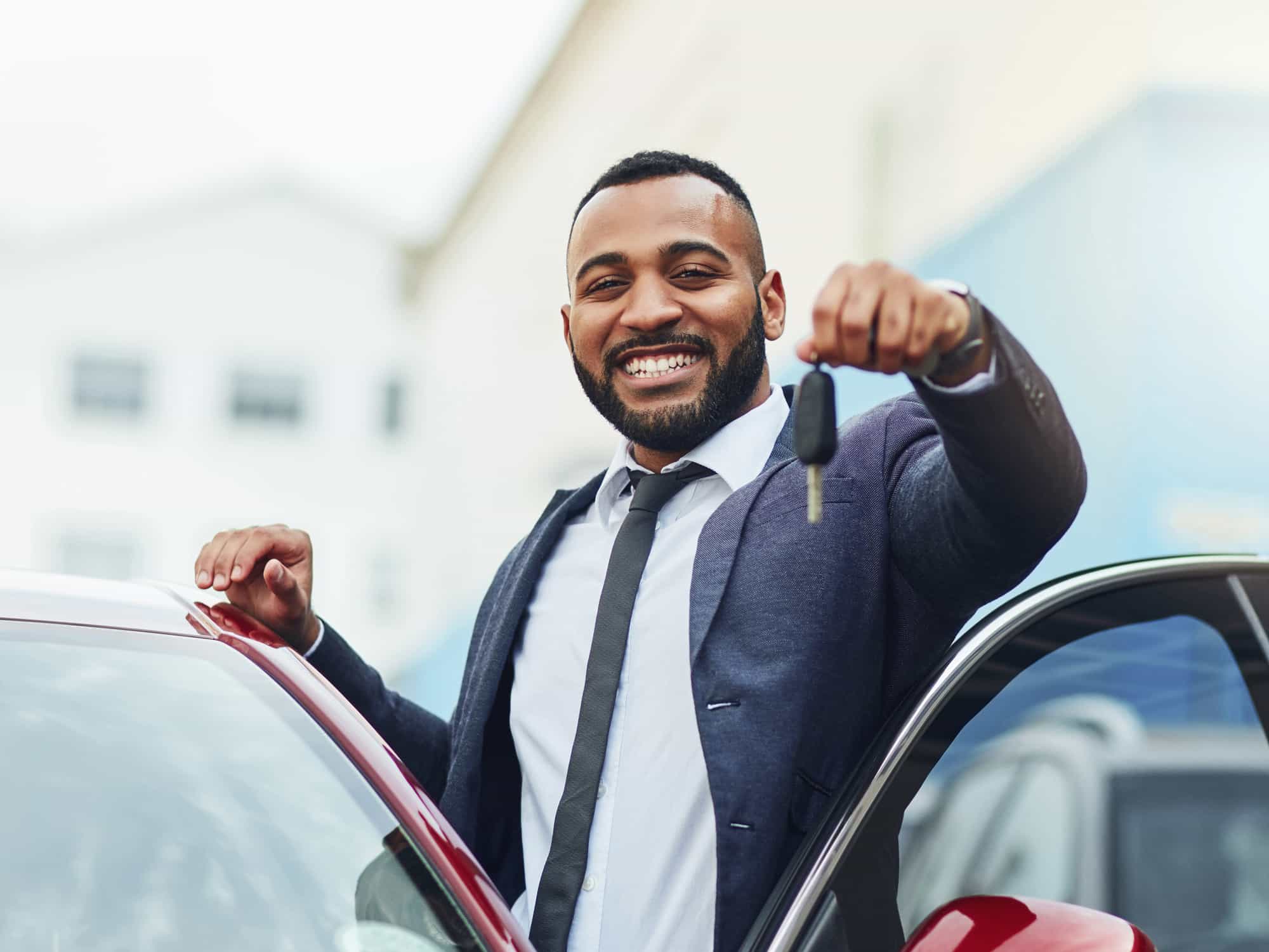 guy holding keys